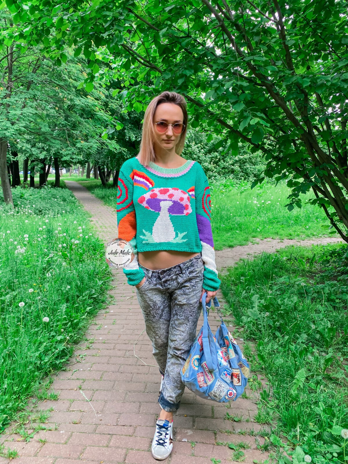hippie style sweater knitting pattern, printed sweater knitting pattern, green sweater, colorful sweater, mushroom sweater, hippie soul jumper knit pattern, women’s hippie art pullover knitting pattern, cropped silhouette, slim fit jumper step by step tutorial, multicolor rainbow pullover free knitting pattern, unique crop sweater pattern, hand knitted summer jumper, hand knitting blog, fashion knitwear patterns, spring pullover crochet pattern, fall sweater buy knitting pattern, sweater for women, autumn pullover for womens, mushroom print sweater pattern free, colorful knitwear fashion, spring outfit ideas, fall womens outfit, women’s chunky knit sweater, round neck pullover, girls summer clothing, womens crew neck sweater knit pattern, scoop neckline jumper knitting chart, knitwear designer, fall clothes patterns buy online, Julie Malic design shop, knitting patterns for beginners, fashion style clothing, street style pullover, knitting inspiration, knitting ideas, patterns by julia malic, simply knitting pattern, abstract sweater easy knitting pattern, mushroom fungi jumper, mushroom knitting chart, gift ideas for her, handmade ideas, hand made clothing, diy clothing, diy gift ideas, winter sweater for ladies knitting patterns, short front long back sweater knitting pattern free, women’s extra long sleeves jumper knit pattern, cozy cotton sweater knitting ideas, toadstool colorwork sweater, geometric color work jumper, cute mushroom print pullover, magical mushroom sweater for women, hippie magic mushroom painting sweater for ladies, women’s take a trip pullover knitting pattern, psychedelic knit pullover, trippy mushroom art knitting pattern, hippie peace mushroom clothing, cartoon hippie mushroom sweater for women knitting pattern, bohemian hippie mushroom jumper, Coachella outfit ideas, stay trippy little hippie, moongirl clothing, moonchild sweater, rainbow mushroom printed pullover knit chart, green forest magic mushroom sweater knitting pattern